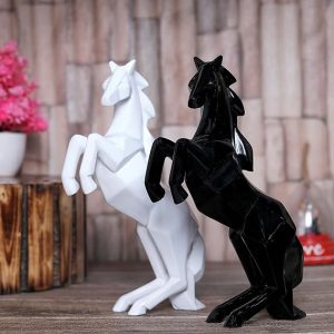 Roll over image to zoom in   3 VIDEOS      GW Creations Horse Showpiece Vastu,Fengshui Figurine |Decor Items | Decorations and Gifting | Running Horse Statue for Money & Wealth - Polyresin (Set of 2 Black & White) (L5 x W11 x H27)